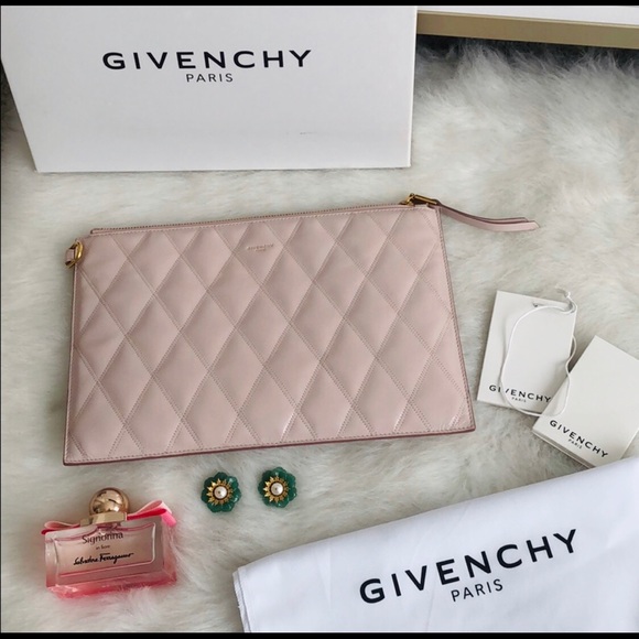 Givenchy Handbags - GIVENCHY MEDIUM POUCH IN DIAMOND QUILTED LEATHER